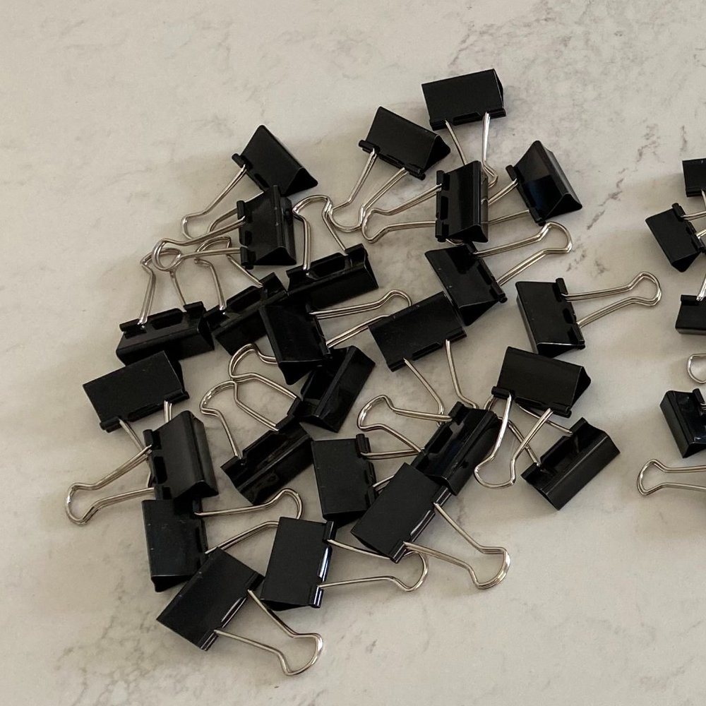 Four size black binder clips bundle